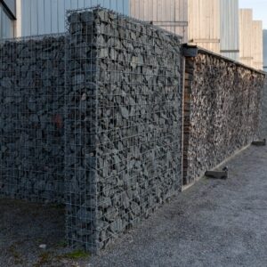 modern-privacy-fence-made-gabion-galvanized-steel-grid-with-granite-stones-min